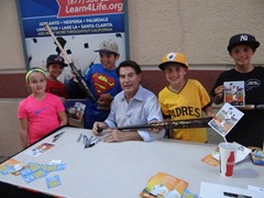 Baseball Great, Steve Garvey signing autographs for fans at a Lancaster Jethawks game.
